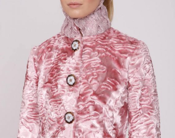 Veronica pink coat worn by a blonde model