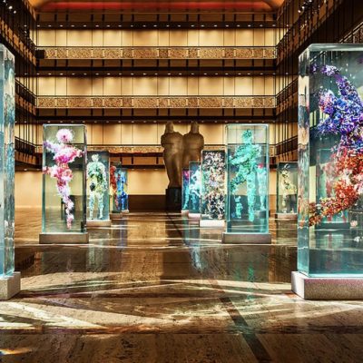 Ballerinas sculptures displayed in a gallery hall