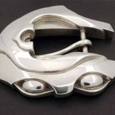 Sculpted silver belt buckle